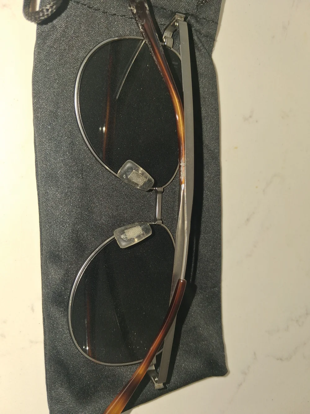 Dunhill Aviator Sunglasses showcases a classic double-bridge metal frame paired
